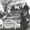 Black and white photograph of NFO farmers and creamery employees ride a bulk truck out to milk dumping site on the Martin Lampi farm near Annandale on March 7, 1963.