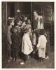 Black and white photograph of Gertrude Brown with children at Phyllis Wheatley House, ca. 1924.