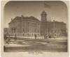 Black and white photograph of the first State Capitol building showing enlargement of 1878. Painted by Alfred Palmquist & Company, 1879.