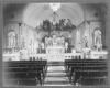 photograph of the altar and main aisle of St. Peter Claver Church