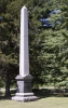 Color image of the obelisk monument in Brook Park Cemetery commemorating the victims of the 1894 fire, August 7, 2017. Photograph by Alan W. Slacter.