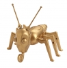 Gold-painted Cootie figure