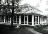 The Rum River side and enclosed porch of the Woodbury House, 1993. Photographer unknown. Anoka County Historical Society, Object ID# 3000.4.32-B. Used with the permission of Anoka County Historical Society.