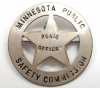 Color image of Minnesota Commission of Public Safety "Peace Officer" badge. 