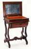 Color image of a Walnut sewing table used by Harriet Bishop. Created in 1850.