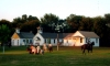 Color image of the reenactment of courthouse battle during the Murray County sesquicentennial celebration, 2007.