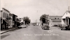 Black and white photograph of Main Street in Currie, 1956.