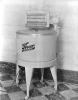 Black and white photograph of a "Thor" brand electric washing machine, ca. 1930s. Photographed by Lee Brothers.