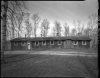 South (front) view of the recreation hall (Building 8), CCC Camp Rabideau F-50. Photo by Jerry Mathiason, 1994. From box 1 (144.G.8.4F) of Historic American Buildings Survey records related to Minnesota structures, 1882-2001, 1883. Manuscripts Collection, Minnesota Historical Society, St. Paul.