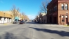 Color image of City hall at corner, looking north on Broadway, Crookston, October 2016.