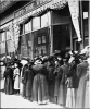 Women waiting in line to vote in an election (probably for a school board) in a downtown Minneapolis precinct c.1908.