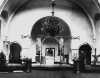 Black and white photograph of the interior of the sanctuary in St. Mary’s Orthodox Cathedral, Minneapolis before decoration, 1905.
