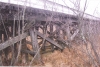 Minnesota and International Railway trestle bridge west side substructure and rail