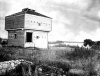 Black and white photograph of the abandoned blockhouse at Fort Ripley, c.1895.