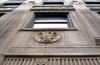 Color image of an eagle medallion and tile work above the main entrance of the Minnesota Building, 2009.