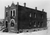 Black and white photograph of Nina Clifford’s brothel at 147 S. Washington Street, St. Paul, 1937. 