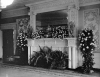 Black and white photograph of a drawing room decorated for Charlotte Hill's wedding to George T. Slade at the James J. Hill house, 240 Summit Avenue, St. Paul, 1901. Photographed by Charles A. Zimmerman.