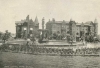 Black and white photograph of Central Park Place East, with the James Humphrey House and the Gustave Schurmeier rowhouses, c.1900.