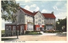 Colorized postcard depicting the exterior of the University Club in St. Paul, c.1920.