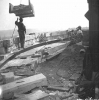 Men working near the capitol dome