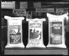 Bags of Northrup, King and Company lawn seeds