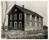 Black and white photograph of St. Ansgar's Academy, predecessor of Gustavus Adolphus College, located in East Union, Carver County from 1863–1876.