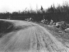 Black and white photograph of wrecked cars along Pike Lake Road near Duluth, 1918.