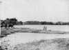 Black and white photograph of Jacob Brower at the Lake Itasca basin at DeSoto Lake, 1889.  