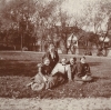 Black and white photograph of Students of St. Joseph’s Academy relaxing on school grounds, 1897.