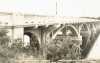 Black and white postcard image of the concrete Anoka–Champlin Mississippi River Bridge, ca. 1929. 