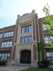 Color image of the front entrance of Marshall Junior High School (now Webster Elementary School) in St. Paul designed by Clarence Wigington and built in 1924 and 1925. Photographed by Paul Nelson on August 15, 2014.