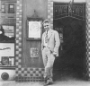 Black and white photograph of Adolf Dehn at the Weyhe Gallery, c.1930.