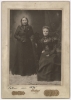 Mary E. Schwandt Schmidt (Mrs. William) and Snana Good Thunder (Maggie Brass), 1899. Photo by Shepherd Photo Studio.