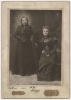 Mary E. Schwandt Schmidt (Mrs. William) and Snana Good Thunder (Maggie Brass), 1899. Photo by Shepherd Photo Studio.