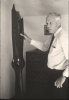 Black and white photograph of Charles Augustus Lindbergh with a plane propeller, c.1971.