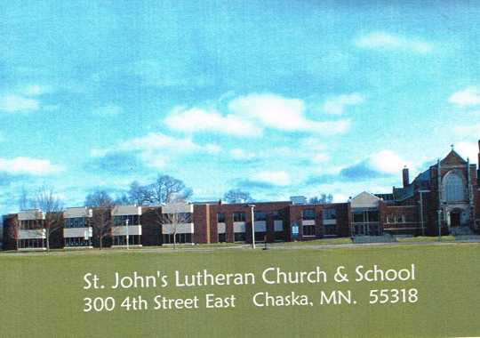 St. John's Lutheran Church and School at 300 4th Street East in Chaska, MN. The church is the long, three-story building; the church is on its far right side. Note the steeple at the far right of the church. Image rights retained by the Carver County Historical Society.