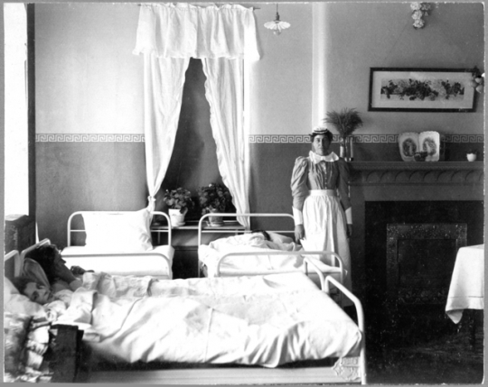 Nurse with patient in Fergus Falls State Hospital