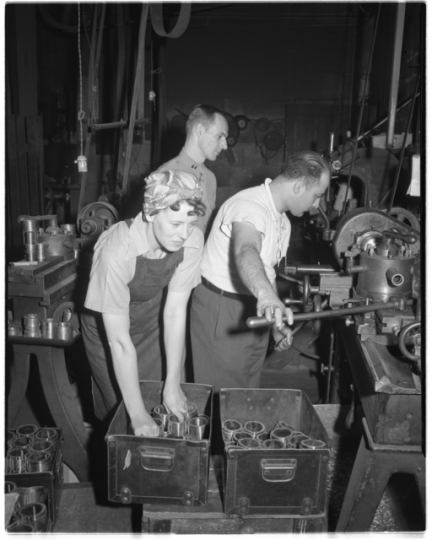 Woman at work in a factory