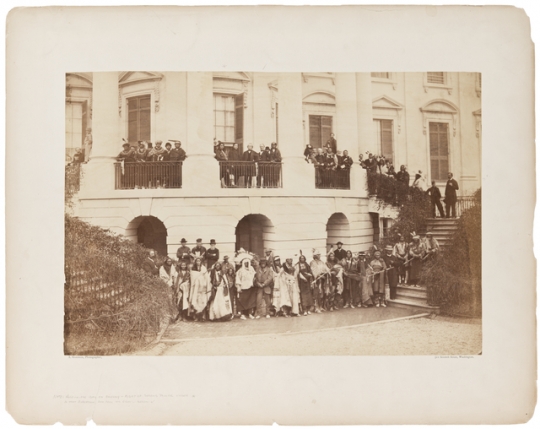 Native delegation in Washington, D.C.; Bagone-giizhig is standing on the balcony, to right of second pillar from the left