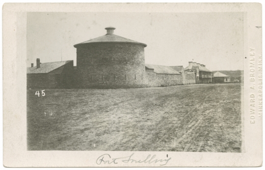 Black and white photograph of an exterior view of Fort Snelling showing the Round Tower, 1863.