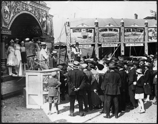 Black and white photograph of sideshows at the Minnesota State Fair, 1917.
