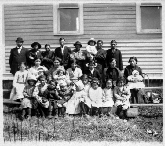 Black and white photograph of an Indian Congregation, Sawyer, Fond du Lac Reservation, 1909–1912.