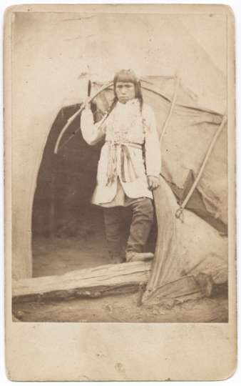 Black and white photograph of a Dakota boy at the concentration camp below Fort Snelling, 1863. Photograph by Whitney’s Gallery.