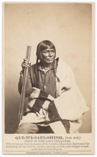 Black and white photograph of Quewesansish (Bad Boy), c.1860. Quewesansish was a leader of the Gull Lake Ojibwe.