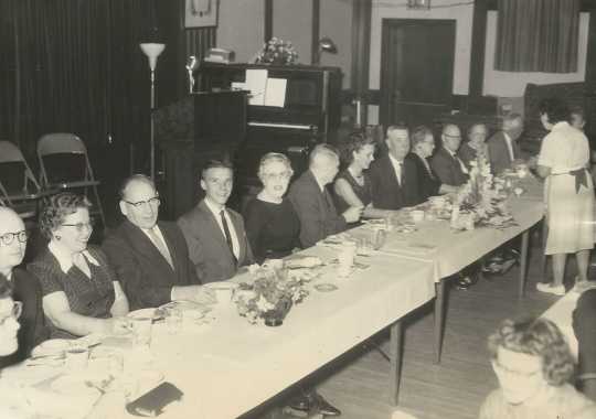 Black and white photograph of BPWC members host employers at an Elks Club banquet on Boss Night, October 1961.