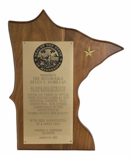 Color image of the plaque that Representative Helen E. McMillan received at her recognition banquet, held on March 18, 1975. 