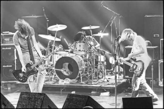 Black and white photograph of Nirvana performing at First Avenue, October 14, 1991. Photograph by Jay Smiley.