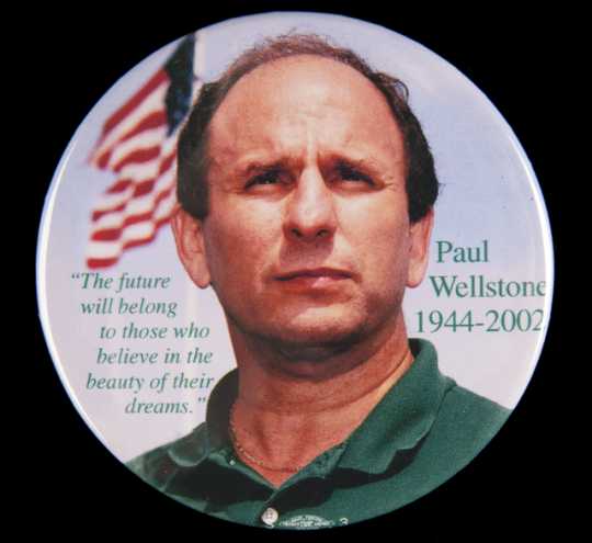 Color image of a pin-back button created to memorialize Paul Wellstone’s death in 2002. 