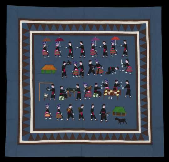 Color image of a Hmong paj ndaub, or story cloth, illustrating Hmong New Year activities. Made in Ban Vinai, Thailand, c.1989.