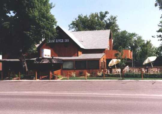 The Rum River Inn bar and restaurant (formerly the Riverside Hotel) in St. Francis, July 1990. Anoka County Historical Society, Object ID# 2057.5.70. Used with the permission of Anoka County Historical Society.